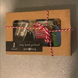 One (1) strand bitty book garland by guteandberg